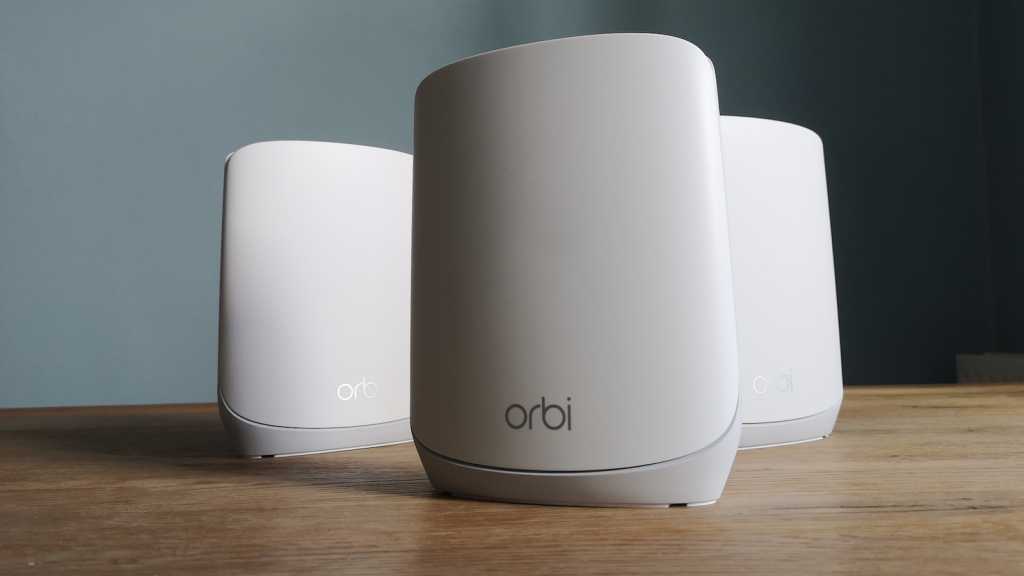 A Netgear Orbi RBR760 router and two RBS760 satellites, viewed from the front