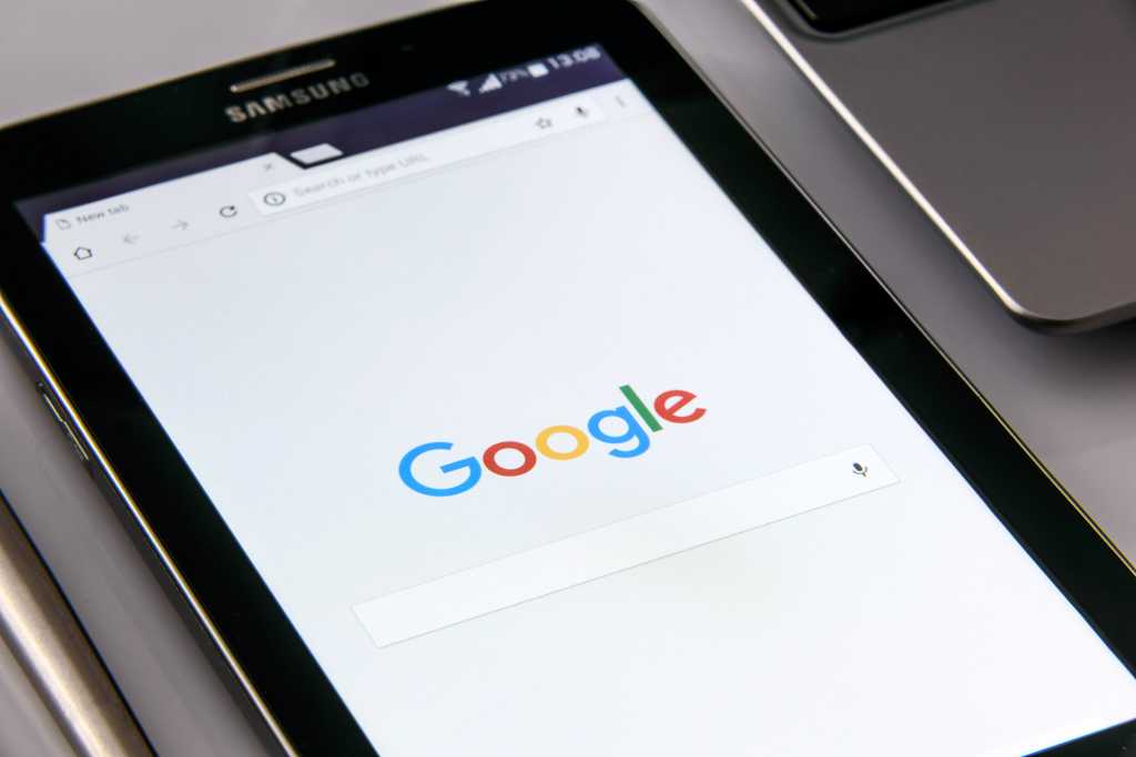 Google Search logo in a browser tab on a tablet